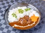 チャンピオン黒毛和牛の牛すじビーフシチュー温玉トッピング(サラダ・ライス付き)（薬院成田屋のカレー＆ビーフシチュー）