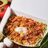 【当店人気No.3】たっぷりチーズでコク旨！レッドチェダーチーズでリゾット風！(濃厚温玉チーズタコライス)（とろ〜り温玉とフレッシュ野菜のタコライス 新川崎鹿島田店）