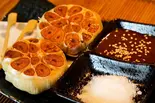 ニンニク丸揚げ【1個】（居酒屋栄ちゃん栄町店）