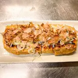 栃尾の油揚げ[納豆入り]焼き（串焼き一献板橋店）