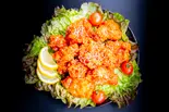 激辛ヤンニョムチキン【中】(鶏肉販売 なかの食鶏 大阪エリア店)