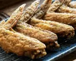 香ばし甘辛手羽先(4本)（釜飯の店 板焚屋）