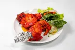 Tandoori chicken タンドリーチキン 2個（クリスタルジョジョすすきの店）