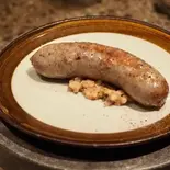 自家製『豚＆ハーブ』ソーセージ（PICICA PICICA PIZZA ＆ PASTA）