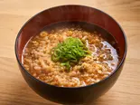 締めの赤だし雑炊（立喰い寿司 二代目けんちゃん）