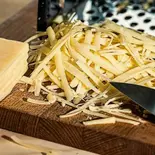 濃厚チーズソース2倍でリゾットのように！ Cheese Sauce（とろ〜り温玉とフレッシュ野菜のタコライス 新川崎鹿島田店）