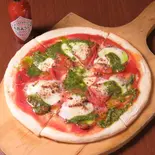 自家製トマトソースのピッツァマルゲリータ（鉄板料理と果実酒 くれいじーグリル 福岡天神店）