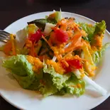 季節野菜のご褒美サラダ(にんじんドレッシング)（本格イタリアン TRATTORIA AL MOMENTO）