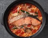 鮭トマトチゲ雑炊 Salmon Tomato Jjigae Rice Porridge（【出汁の旨みとたっぷり具材】雑炊の気分 池袋東口店）