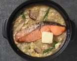 鮭味噌バター雑炊 Salmon Miso Butter Rice Porridge（【出汁の旨みとたっぷり具材】雑炊の気分 池袋東口店）
