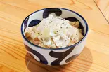 ネギ塩豚丼（蕎麦とラー油で幸なった。日本橋店）