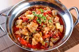 カエル肉の四川風旨辛炒め【川覇香辣牛蛙】（川覇王）