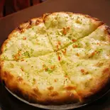 ガーリックチーズナン GARLIC CHEESE NAAN（インドネパール料理カレースプーン Curry Spoon）