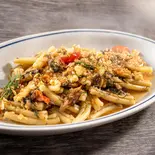 イワシ、松の実、レーズン、ウイキョウのショートパスタ（南イタリア料理 Osteria NORA）