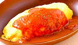 オムライスの特製デミソースがけ(餃子工房 ちびすけ 阿倍野橋店)