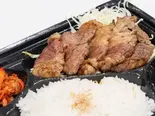 名物カルビ肉弁当（【がっつり系スタミナ焼肉丼】本町グランドスラム焼肉）