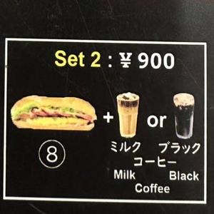 ソーセージと卵バインミー + ブラックコーヒーソーセージと卵バインミー + ブラックコーヒー