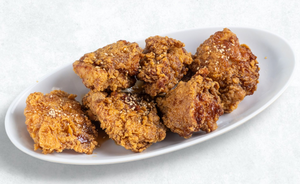 【人気】若鶏の唐揚げレモンソースがけ [Very Popular] Fried Chicken with Lemon Sauce