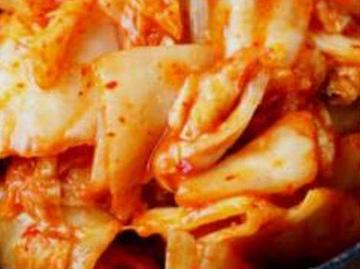 キムチ - 辛さと酸味が絶妙なバランスを奏でる